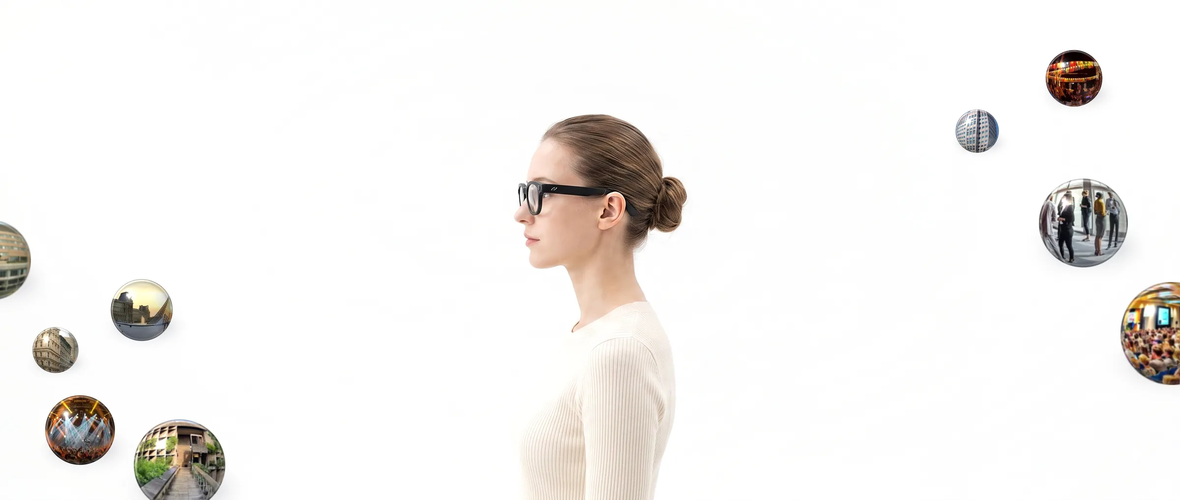 A person wearing AURVIZ o1 smartglasses in profile, memory
                                bubbles floating in the space around them